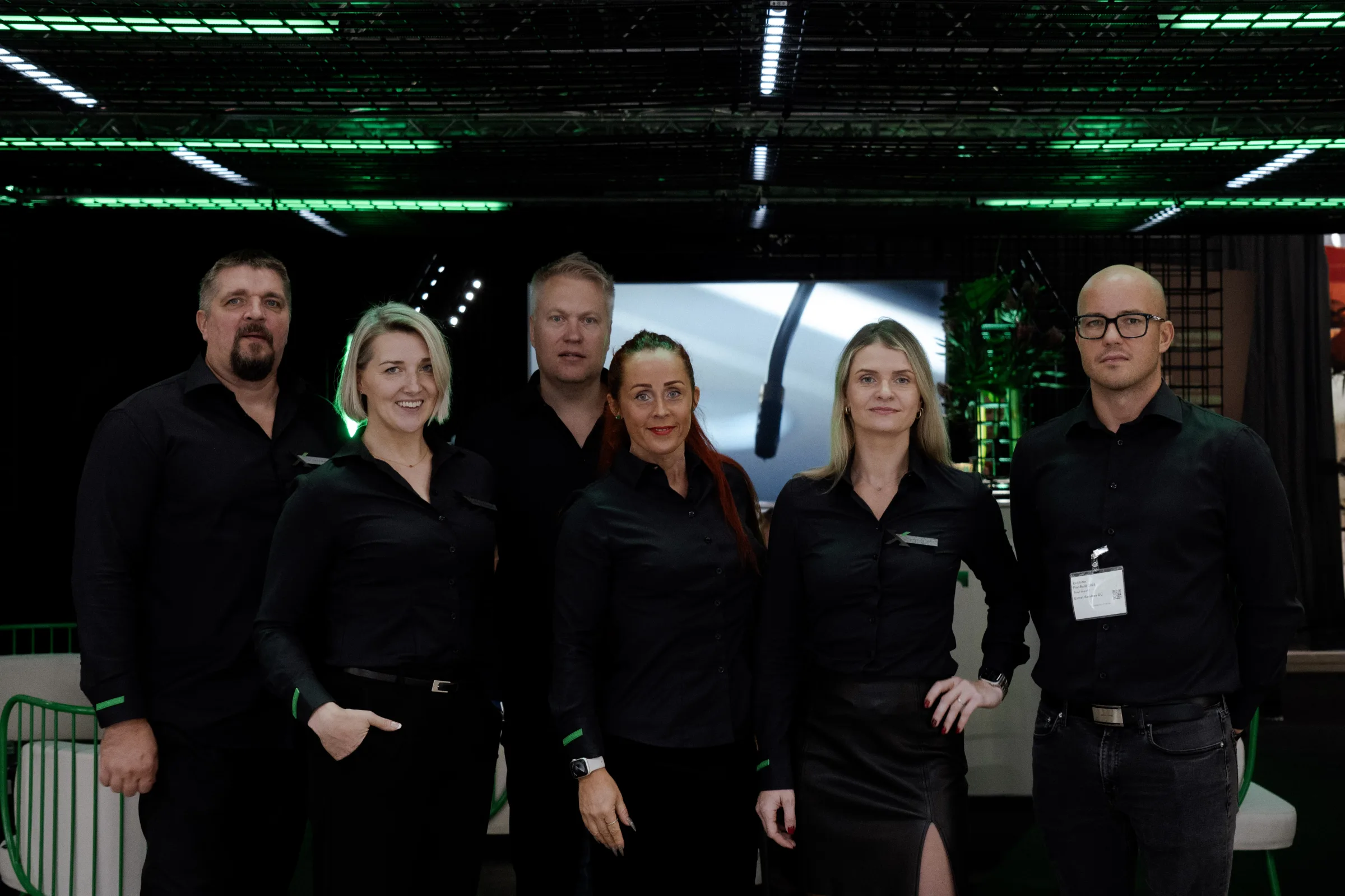 Exmet Group team gathered inside the booth at a previous event